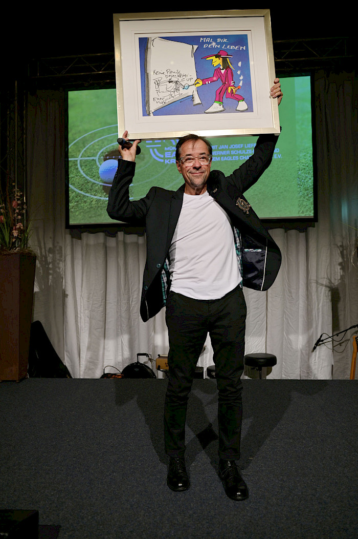 Jan Josef Liefers versteigert Gemälde von Udo Lindenberg